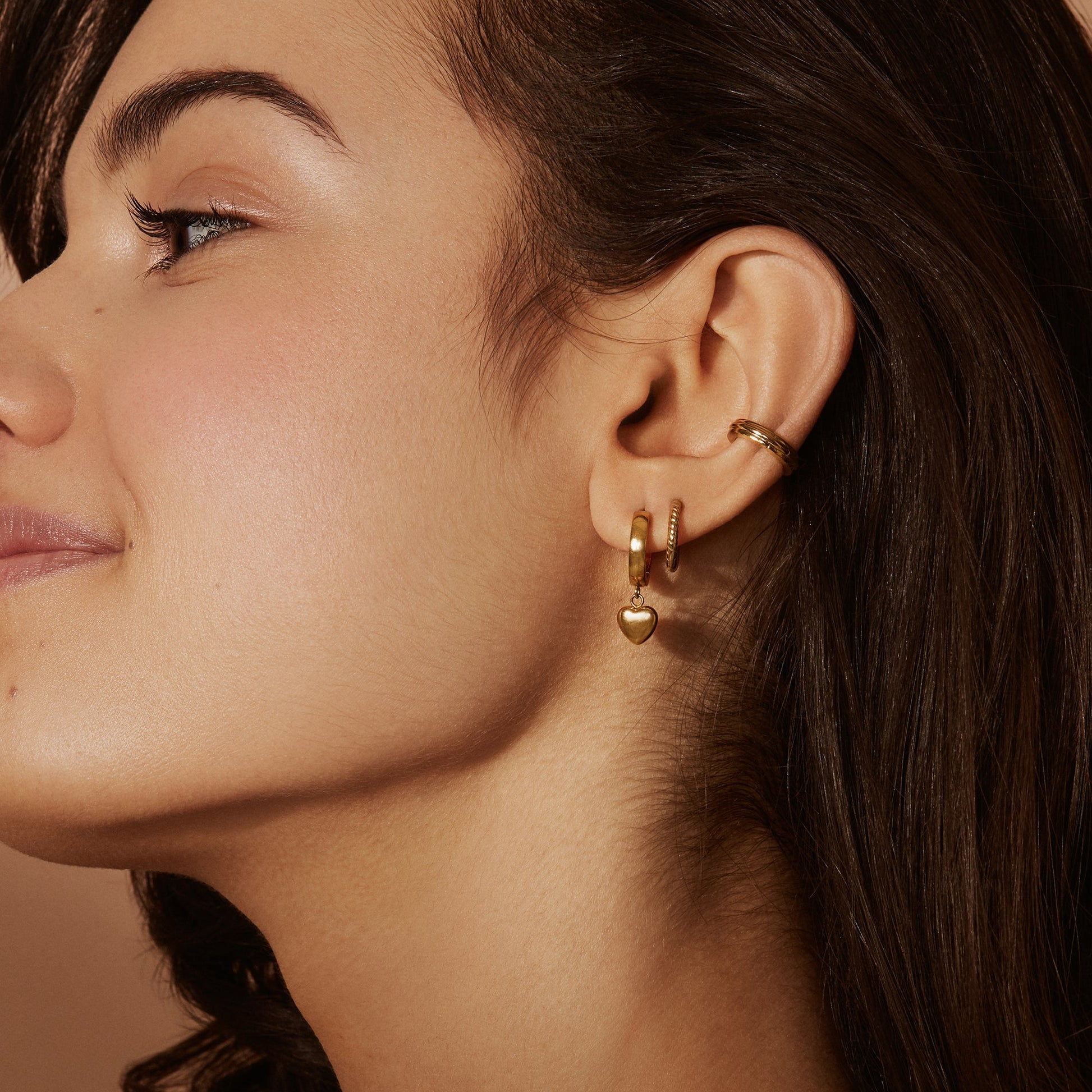 Rosegold twisted huggies earrings you can sleep with comfortable stainless steel MIA