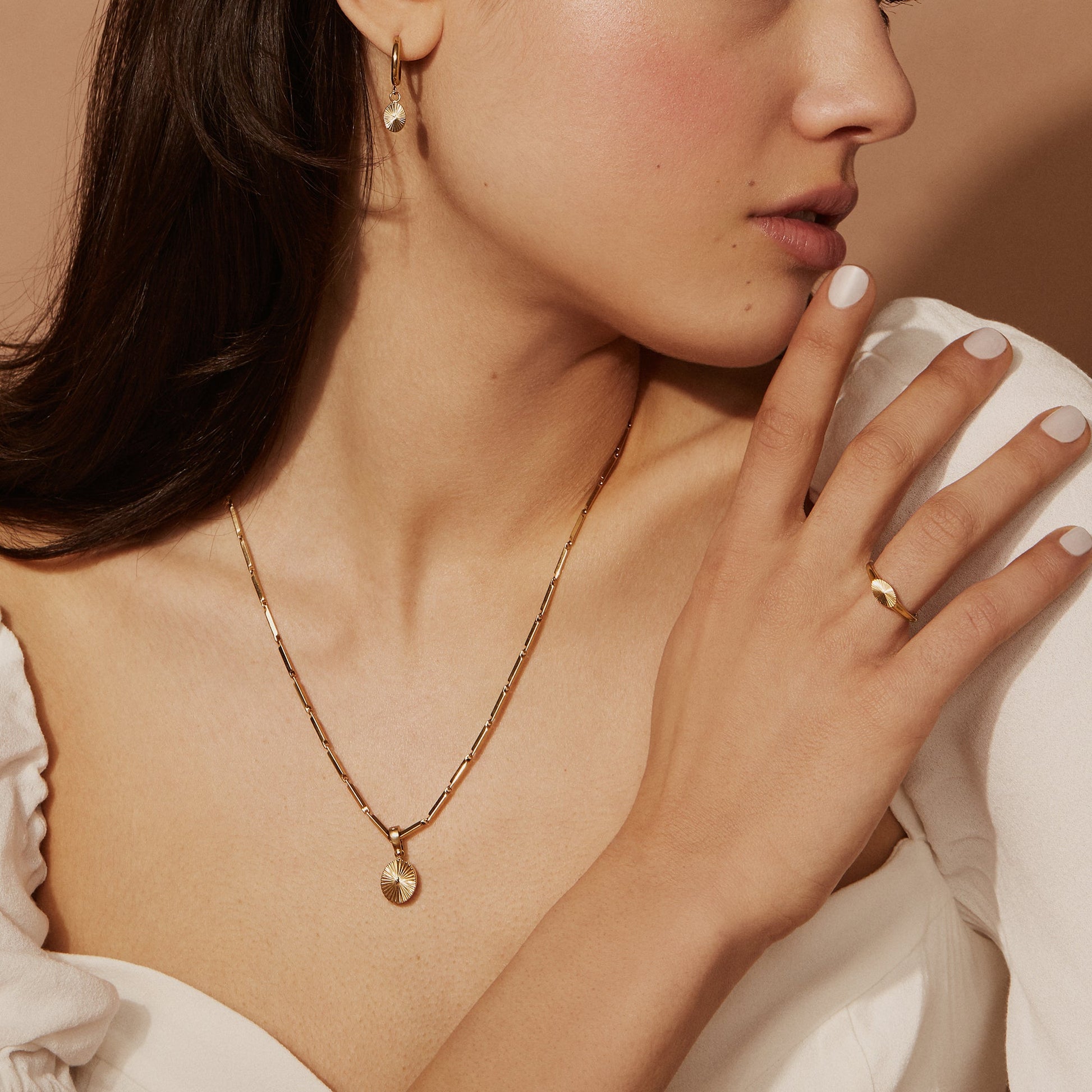 Gold Stainless steel hoop earrings with sun pendant comfortable MIA