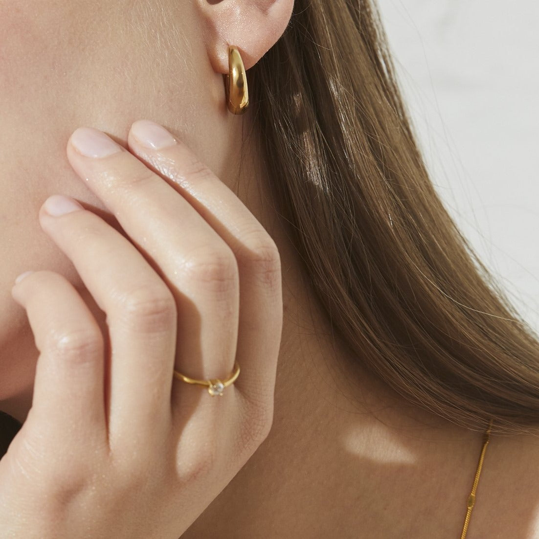 Small gold puffy hoop earrings hypoallergenic T119E003DO MIA JEWELRY