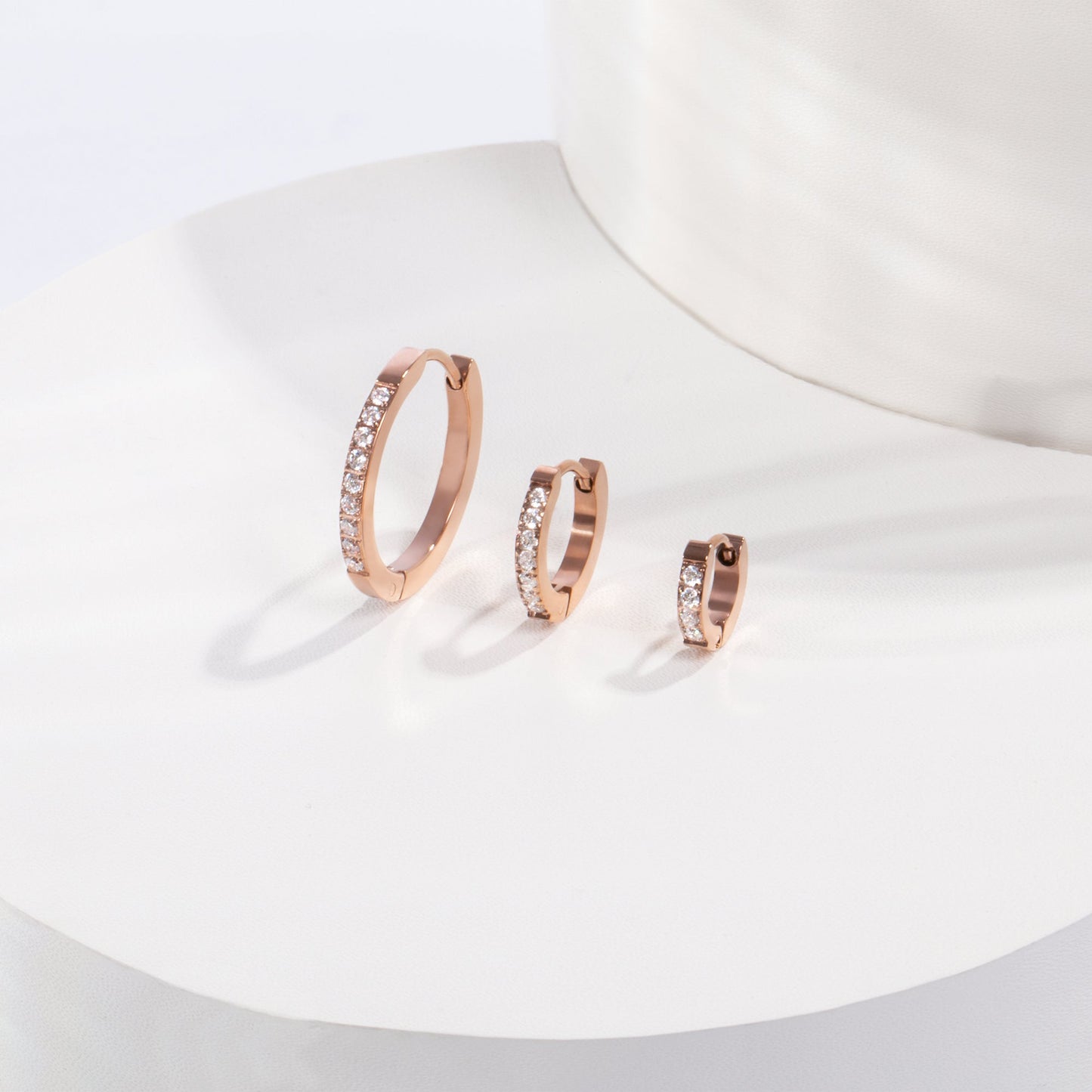 Women stainless steel half eternity huggie hoops with stones MIAJWL Boucles d'oreilles éternité avec pierres acier inoxydable pour femmes Mia Bijoux